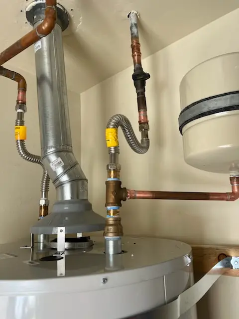 Water heater installation and plumbing repair in Ira